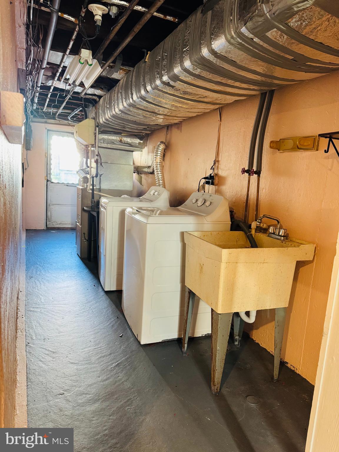 5237 North Springfield Road Clifton Heights, PA 19018 - Photo 11 of 13 a utility room with dryer and washer
