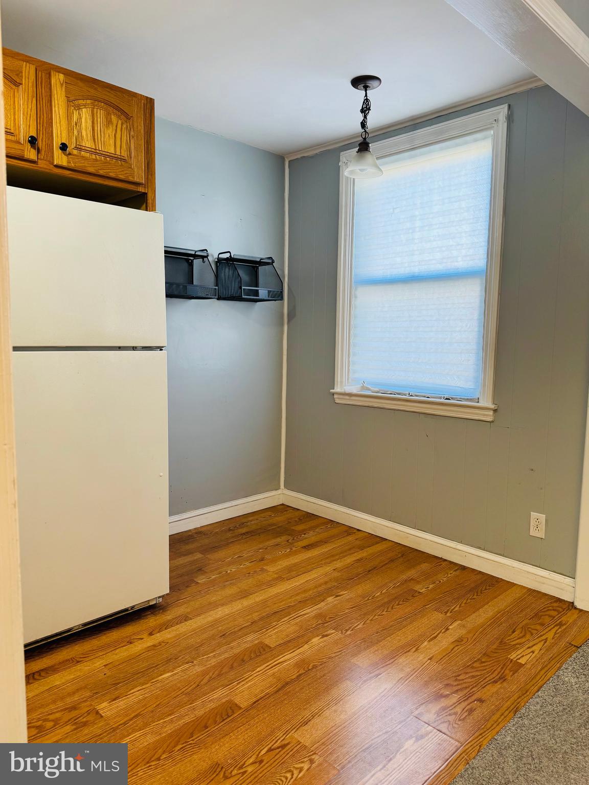 5237 North Springfield Road Clifton Heights, PA 19018 - Photo 5 of 13 a view of a refrigerator in an empty room