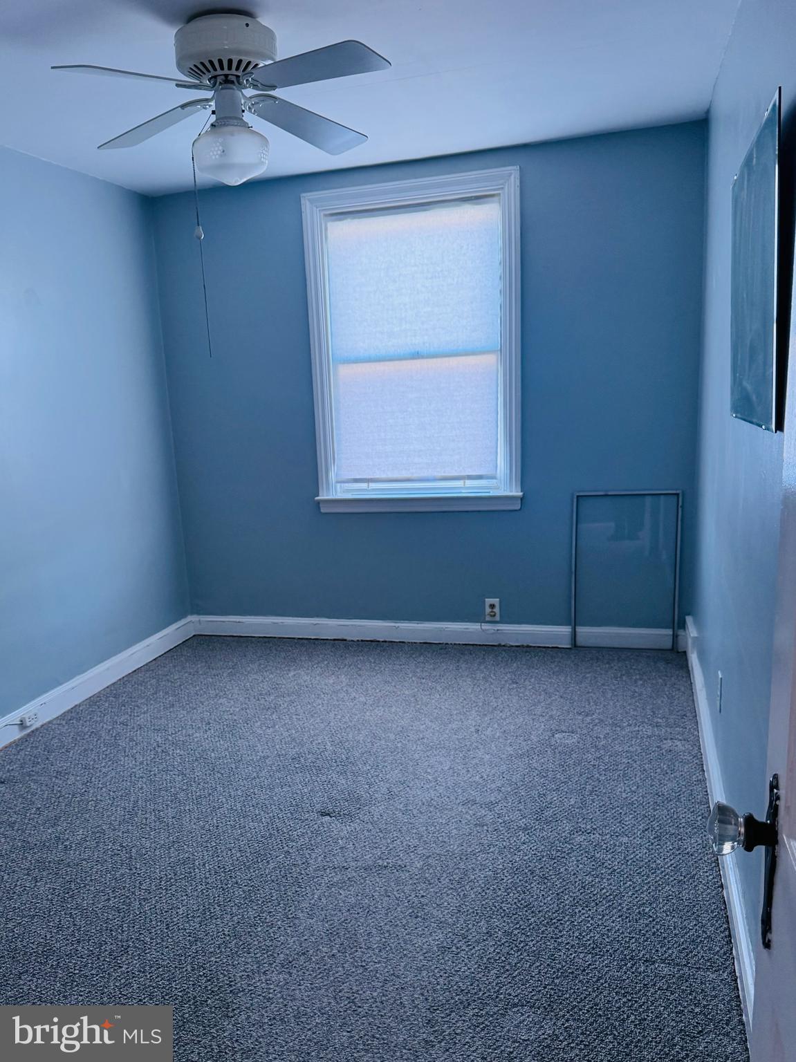 5237 North Springfield Road Clifton Heights, PA 19018 - Photo 7 of 13 an empty room with a window and a fan
