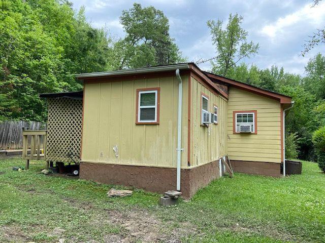 4231 Blanton Avenue Southwest Atlanta, GA 30331 - Photo 3 of 10 a view of backyard with barbeque grill and wooden fence