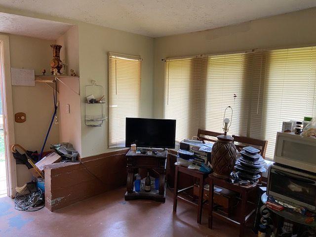 4231 Blanton Avenue Southwest Atlanta, GA 30331 - Photo 5 of 10 a bedroom with furniture and a window