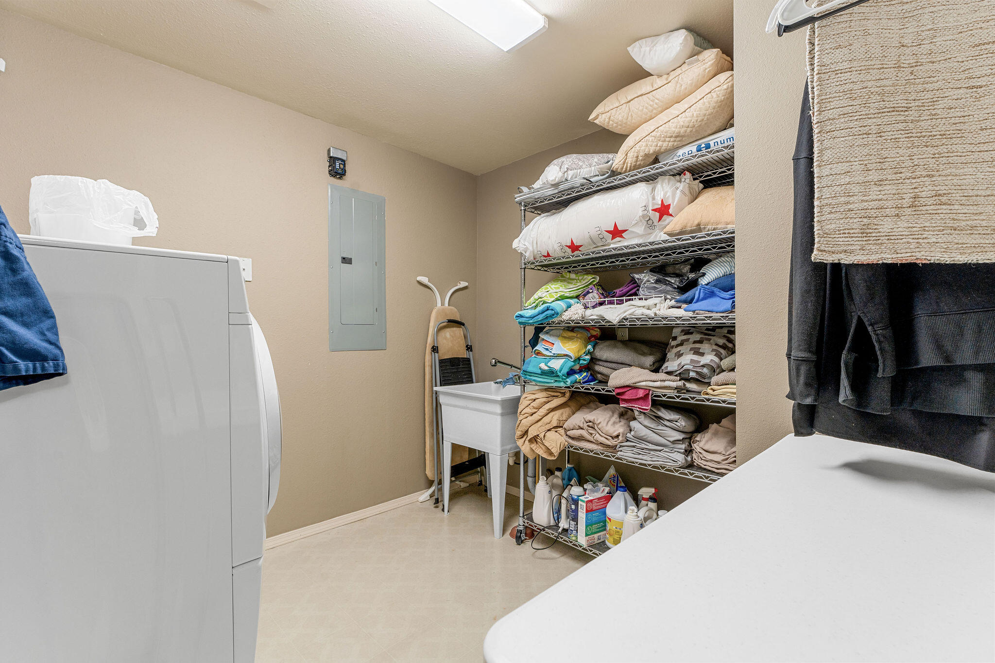 201 Point Seven Road, Unit 8 Kimberling City, MO 65686 - Photo 35 of 55 Sink & Extra Laundry Room Storage