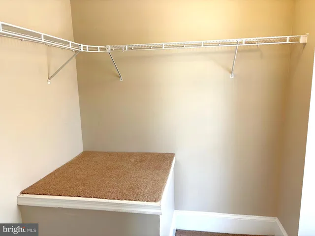 a bathroom with a shower and a bath tub