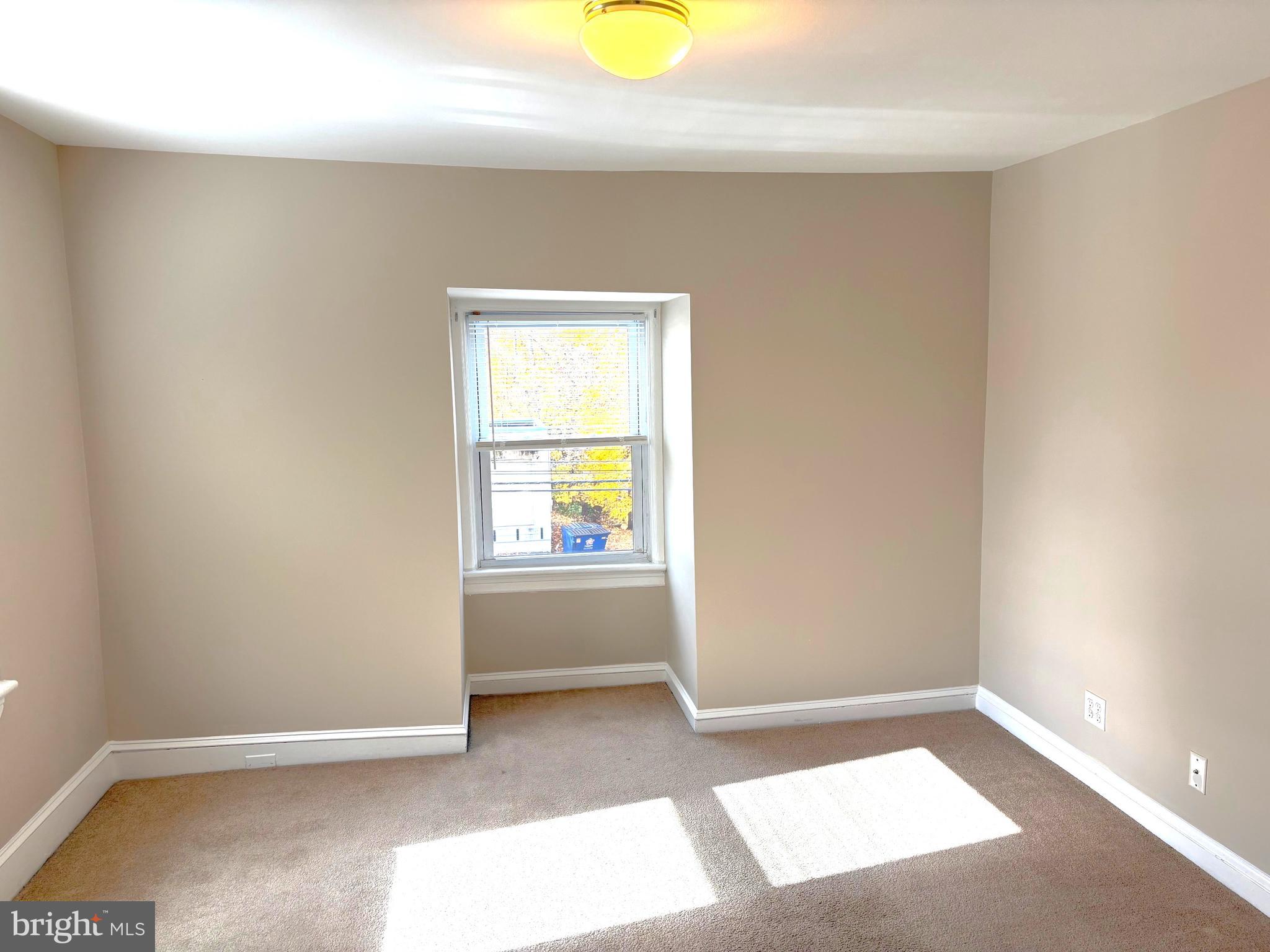 1643 Rockwell Road, Unit 5 Abington, PA 19001 - Photo 6 of 19 an empty room with windows