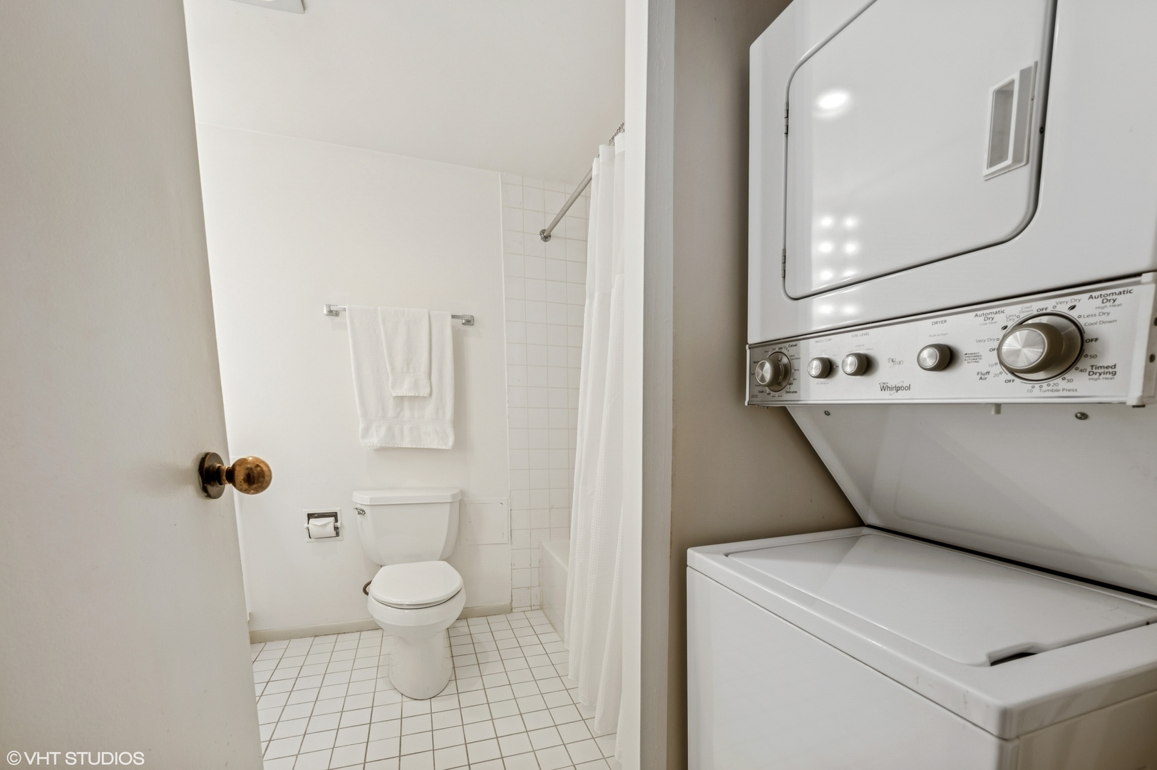 40 East Delaware Place, Unit 301 Chicago, IL 60611 - Photo 18 of 21 a bathroom with a granite countertop sink a toilet and a mirror