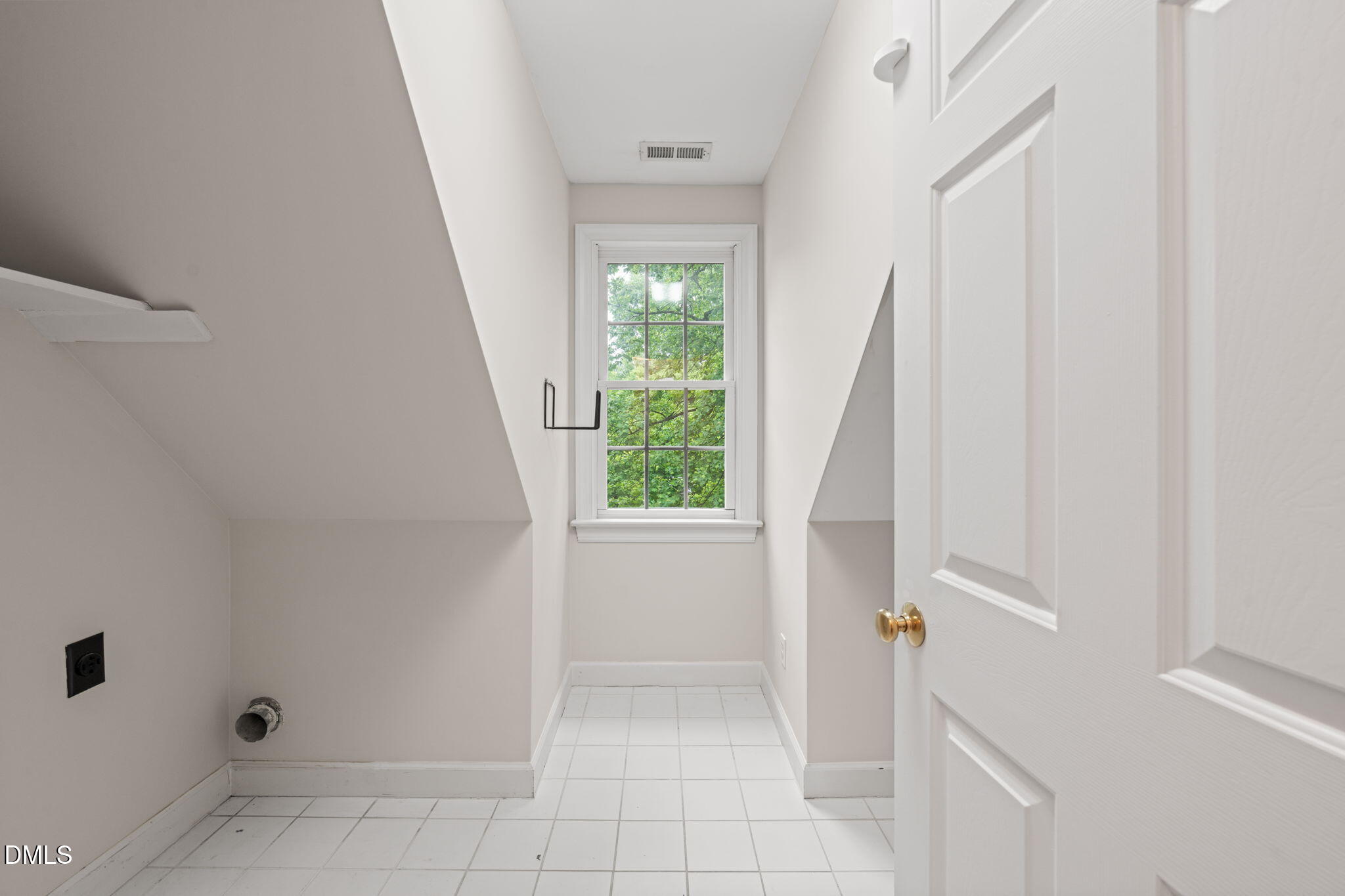 5809 Stone Spring Road Raleigh, NC 27613 - Photo 36 of 54 a view of entryway with window and stairs