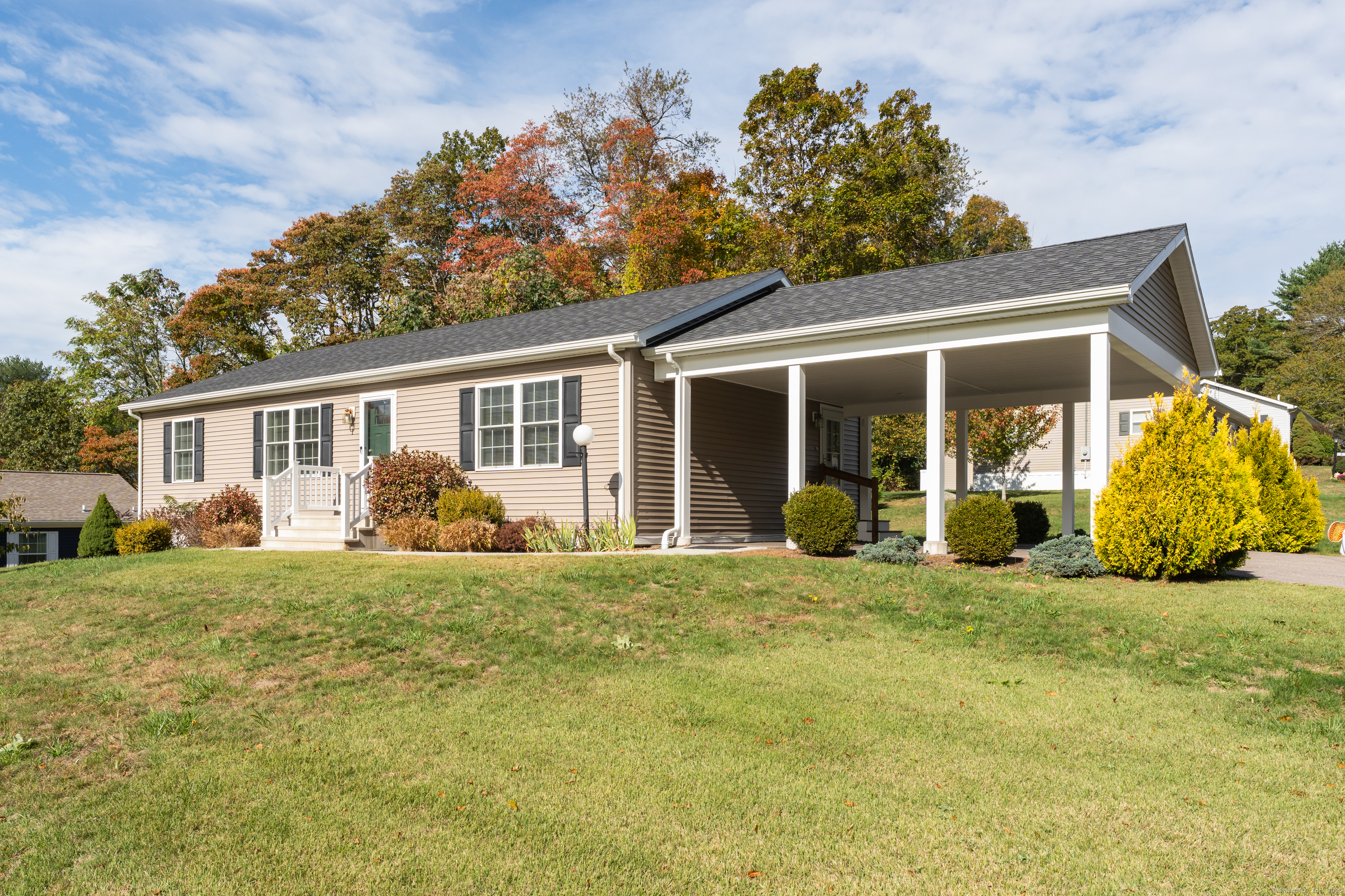 1 High Ridge Circle Montville, CT 06382 - Photo 1 of 39 a view of a house with backyard sitting area and garden