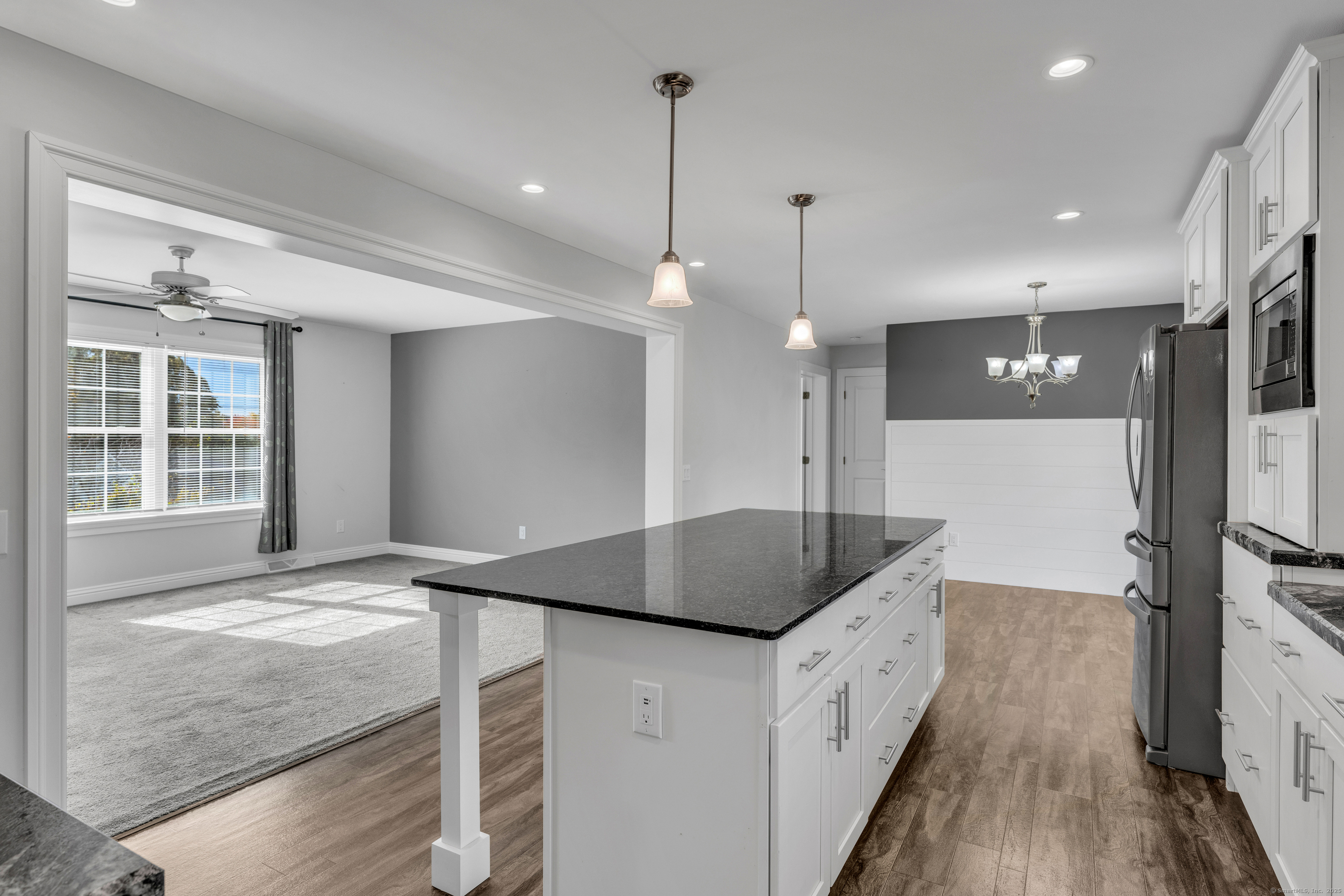 1 High Ridge Circle Montville, CT 06382 - Photo 11 of 39 a kitchen with a refrigerator a sink and wooden floor
