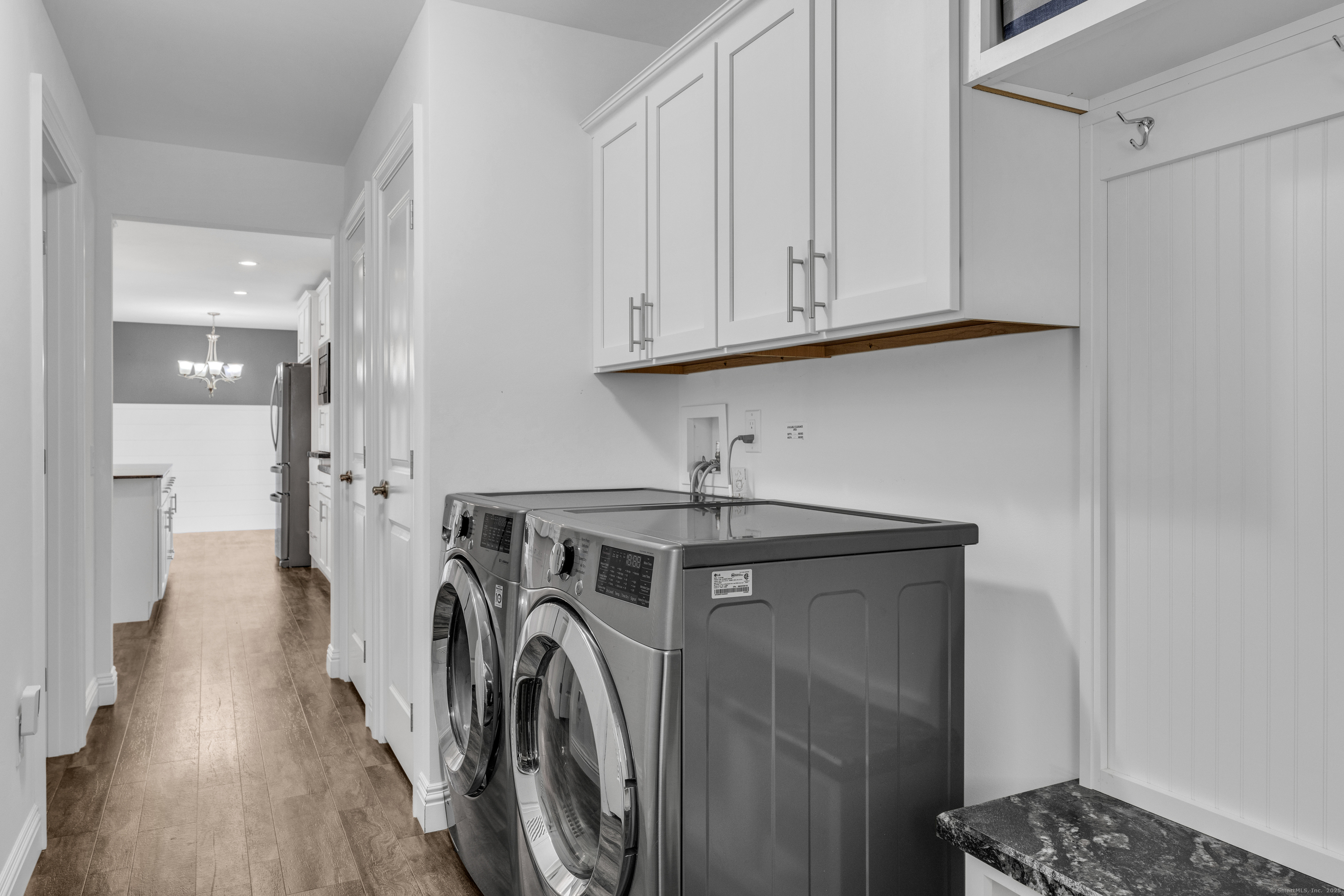 1 High Ridge Circle Montville, CT 06382 - Photo 26 of 39 a utility room with wooden floor washer and dryer