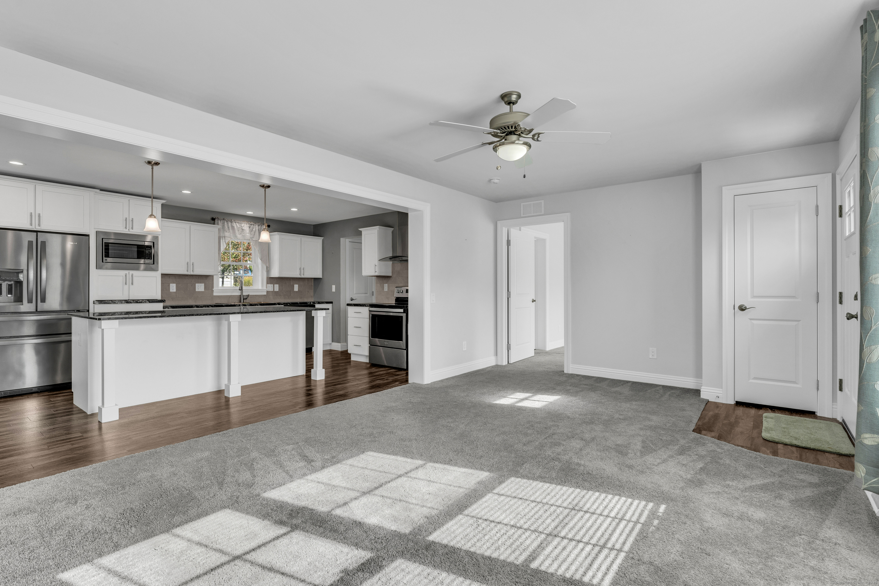 1 High Ridge Circle Montville, CT 06382 - Photo 27 of 39 a view of kitchen with refrigerator and microwave