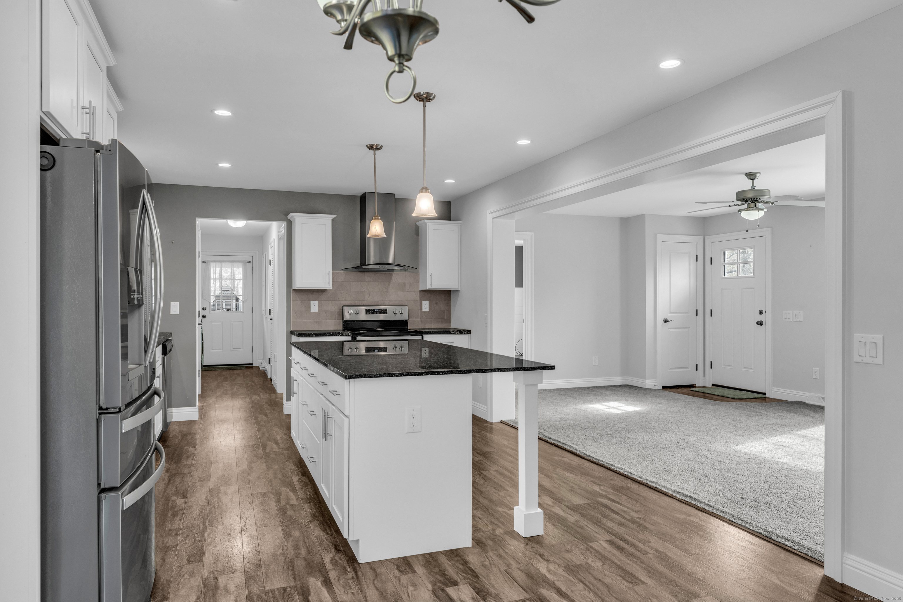 1 High Ridge Circle Montville, CT 06382 - Photo 8 of 39 a kitchen with stainless steel appliances granite countertop a sink a stove and a refrigerator