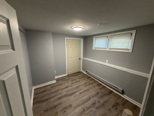 2 Gladeside Terrace, Unit 1 Boston, MA 02126 - Photo 17 of 20 a view of room with window and hardwood floor