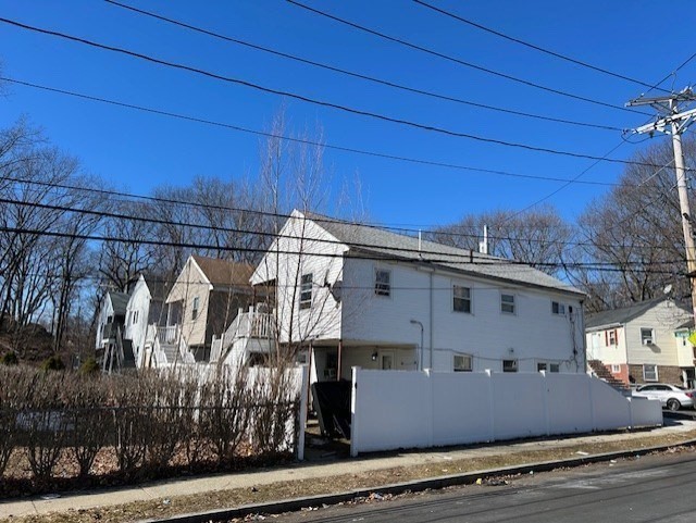 2 Gladeside Terrace, Unit 1 Boston, MA 02126 - Photo 20 of 20 a view of a house with a balcony