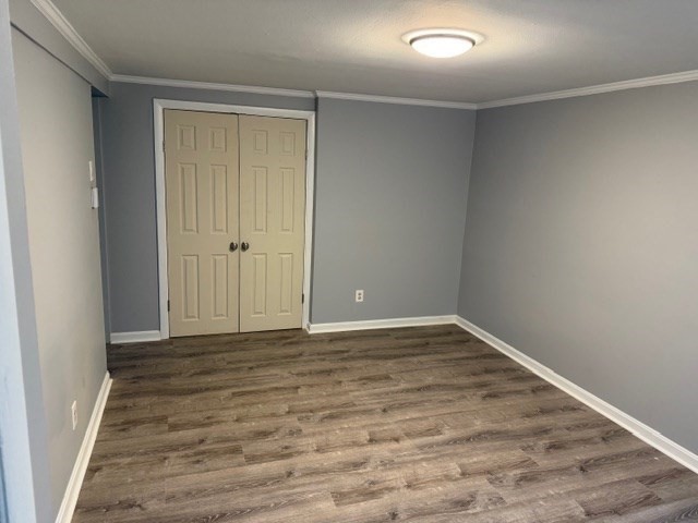 2 Gladeside Terrace, Unit 1 Boston, MA 02126 - Photo 3 of 20 a view of an empty room with wooden floor