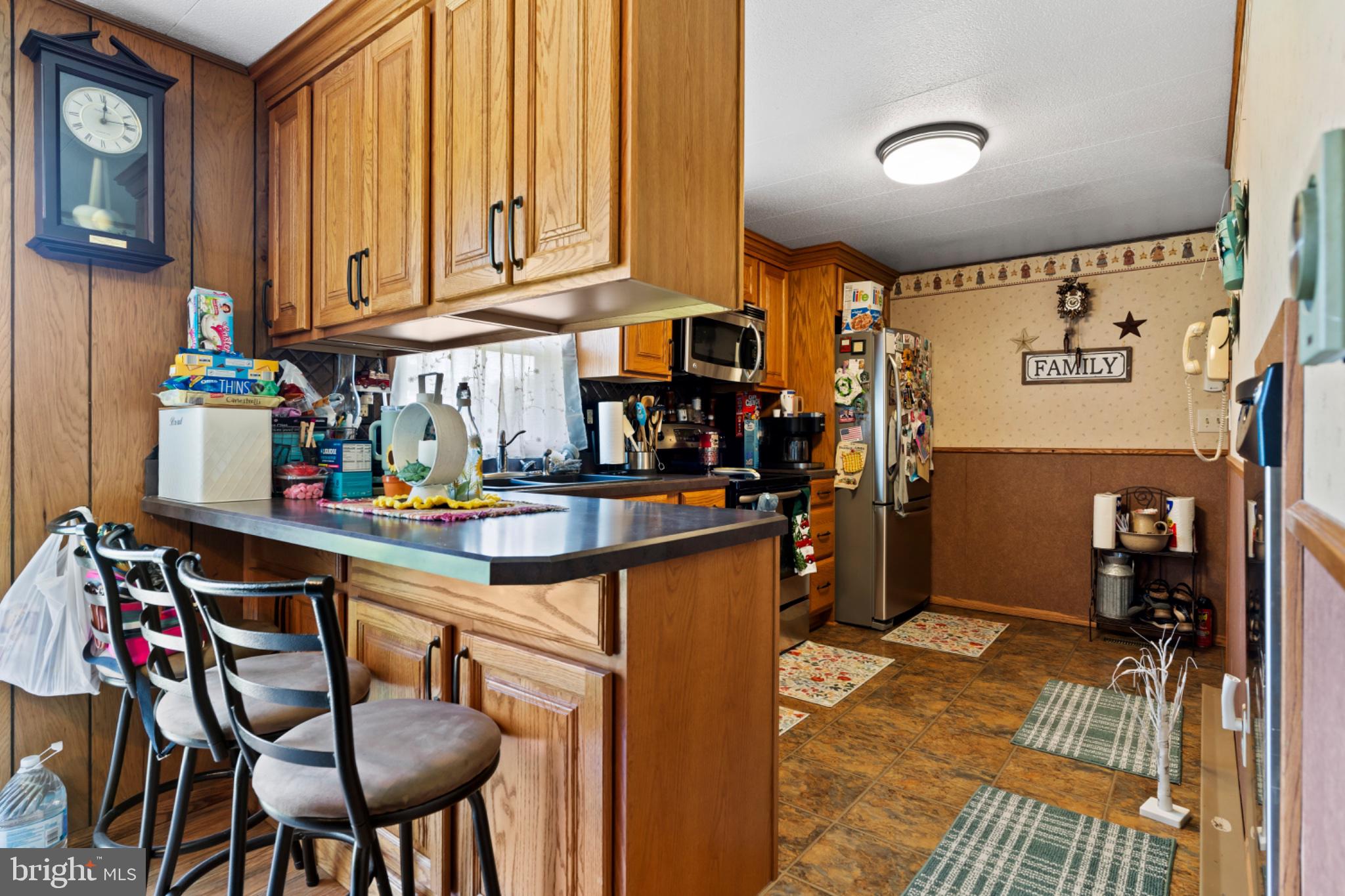 7296 Thompson Road Needmore, PA 17238 - Photo 15 of 40 Cozy kitchen with warm wood accents.