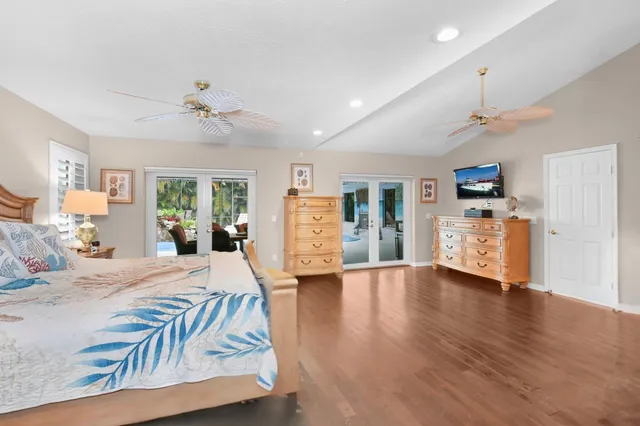 a view of a palm trees in front of a house