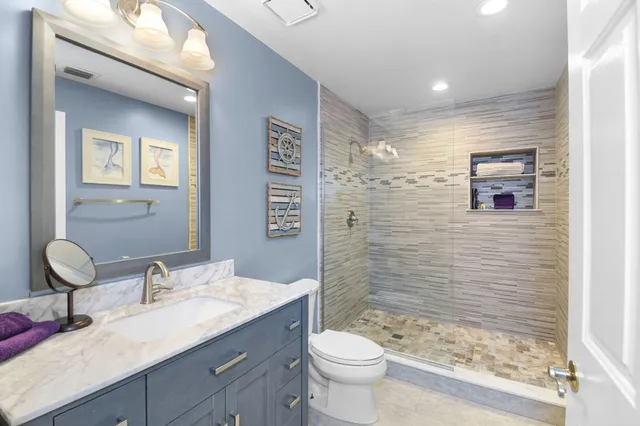 an aerial view of a houses with outdoor space