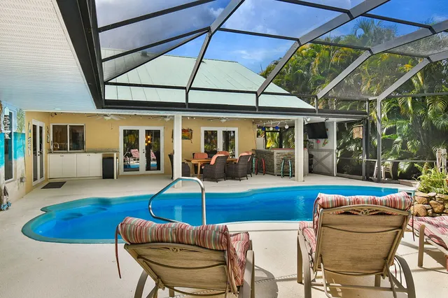 a view of lake and houses with outdoor space