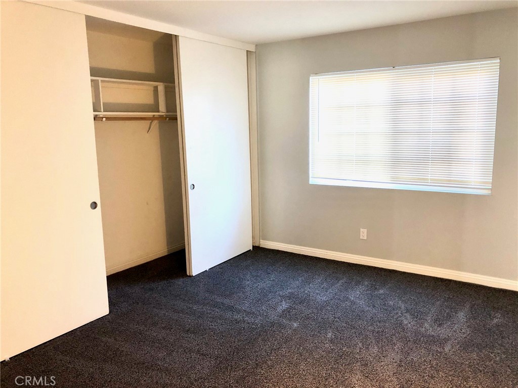 7100 Cerritos Avenue, Unit 85 Stanton, CA 90680 - Photo 9 of 9 a view of an empty room with a window