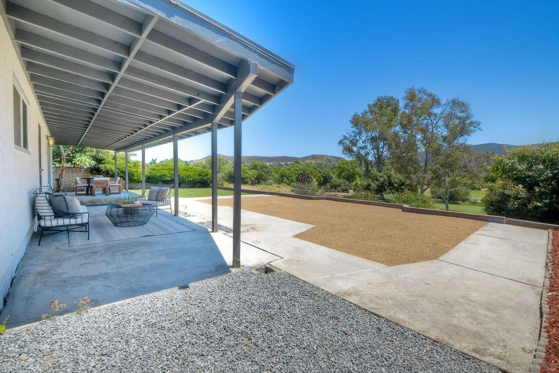 9045 Inverness Road Santee, CA 92071 - Photo 23 of 28 a view of a backyard of a house