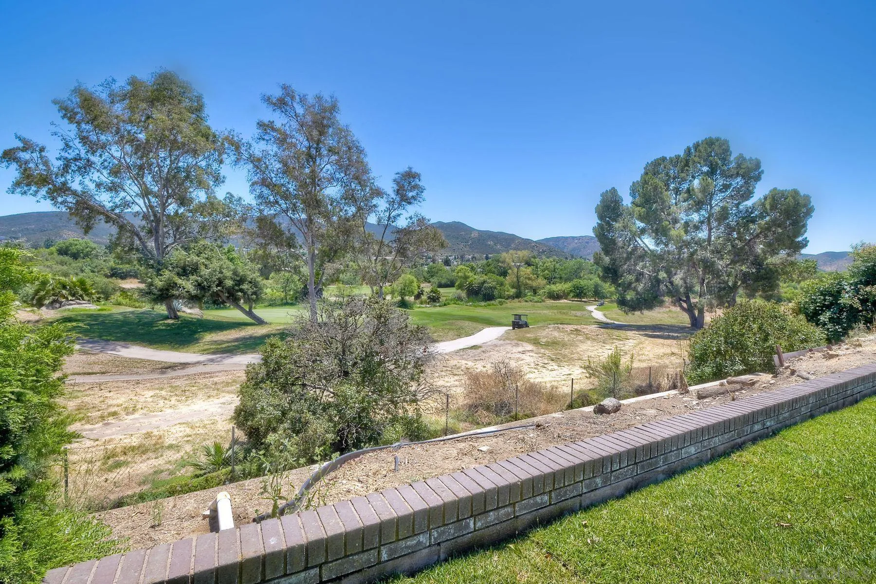 9045 Inverness Road Santee, CA 92071 - Photo 24 of 28 a view of a lake from a yard