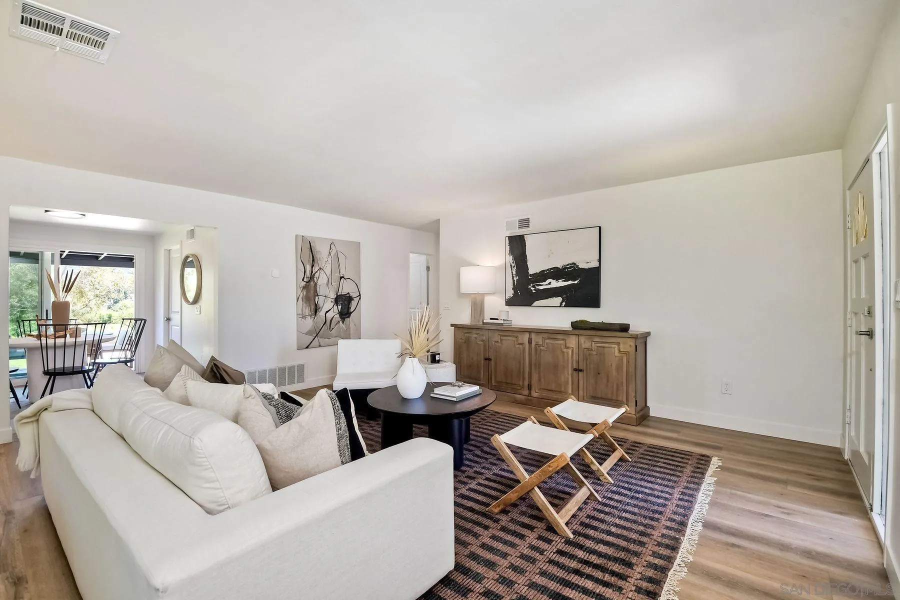 9045 Inverness Road Santee, CA 92071 - Photo 3 of 28 a living room with furniture and a rug