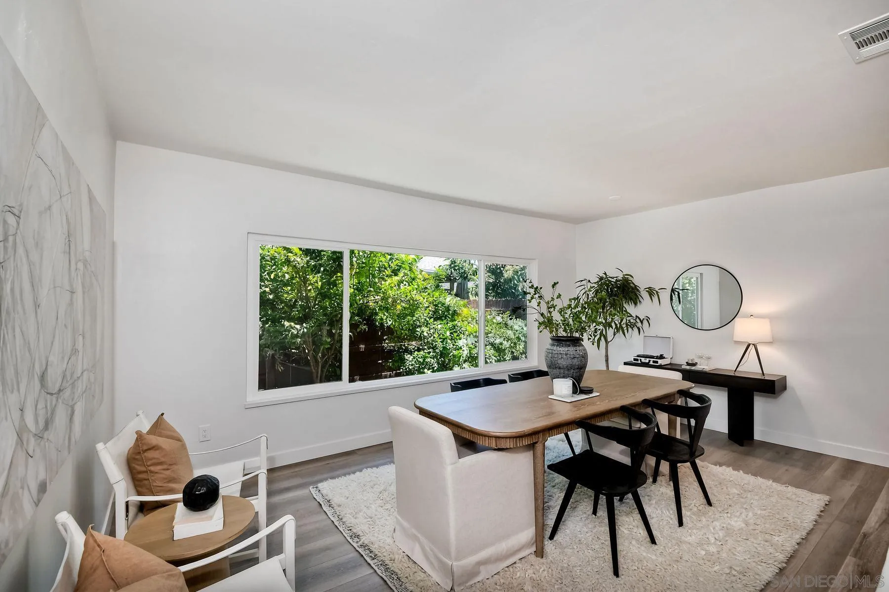 9045 Inverness Road Santee, CA 92071 - Photo 4 of 28 a dining room with furniture and window