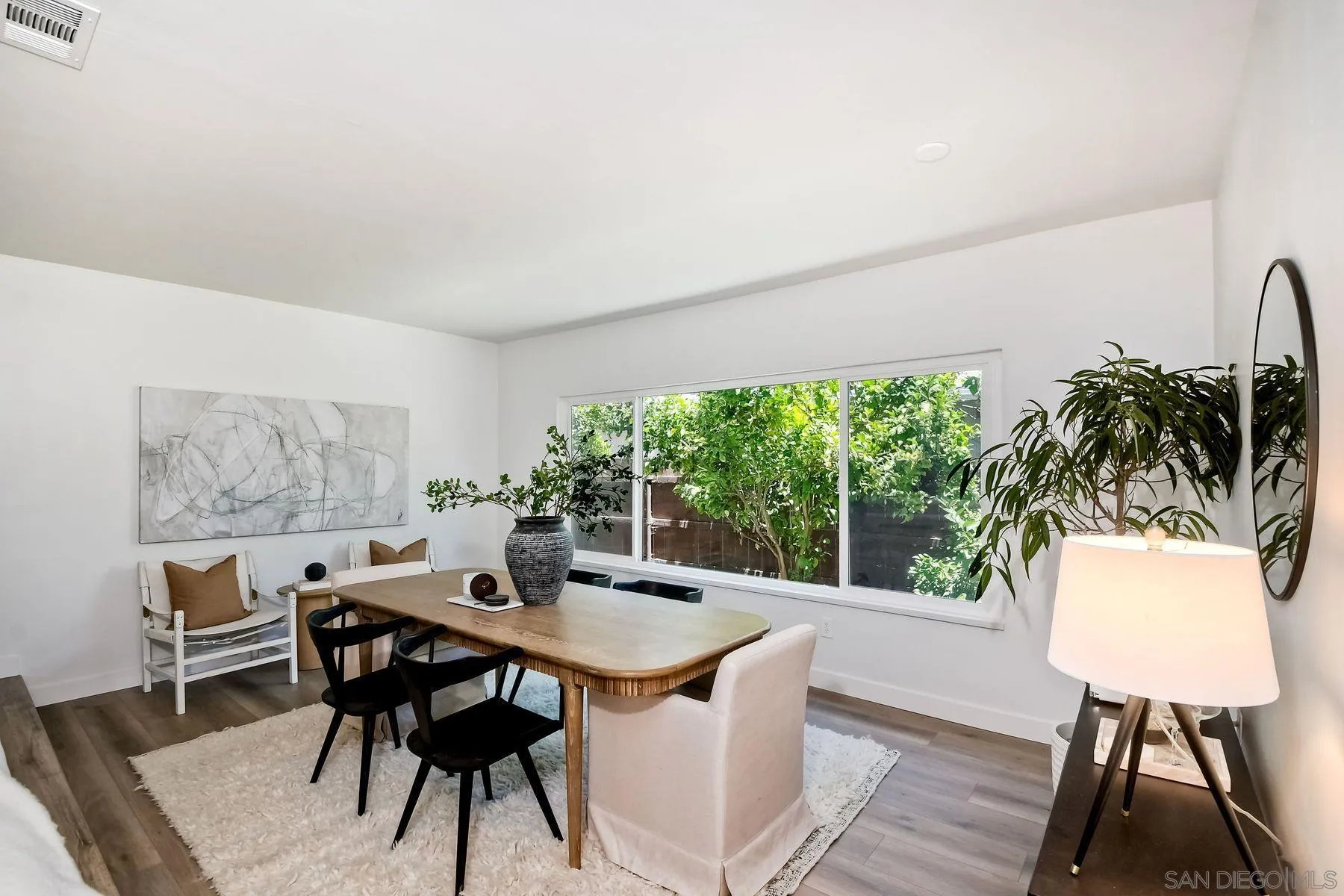 9045 Inverness Road Santee, CA 92071 - Photo 5 of 28 a view of a dining room with furniture window and wooden floor