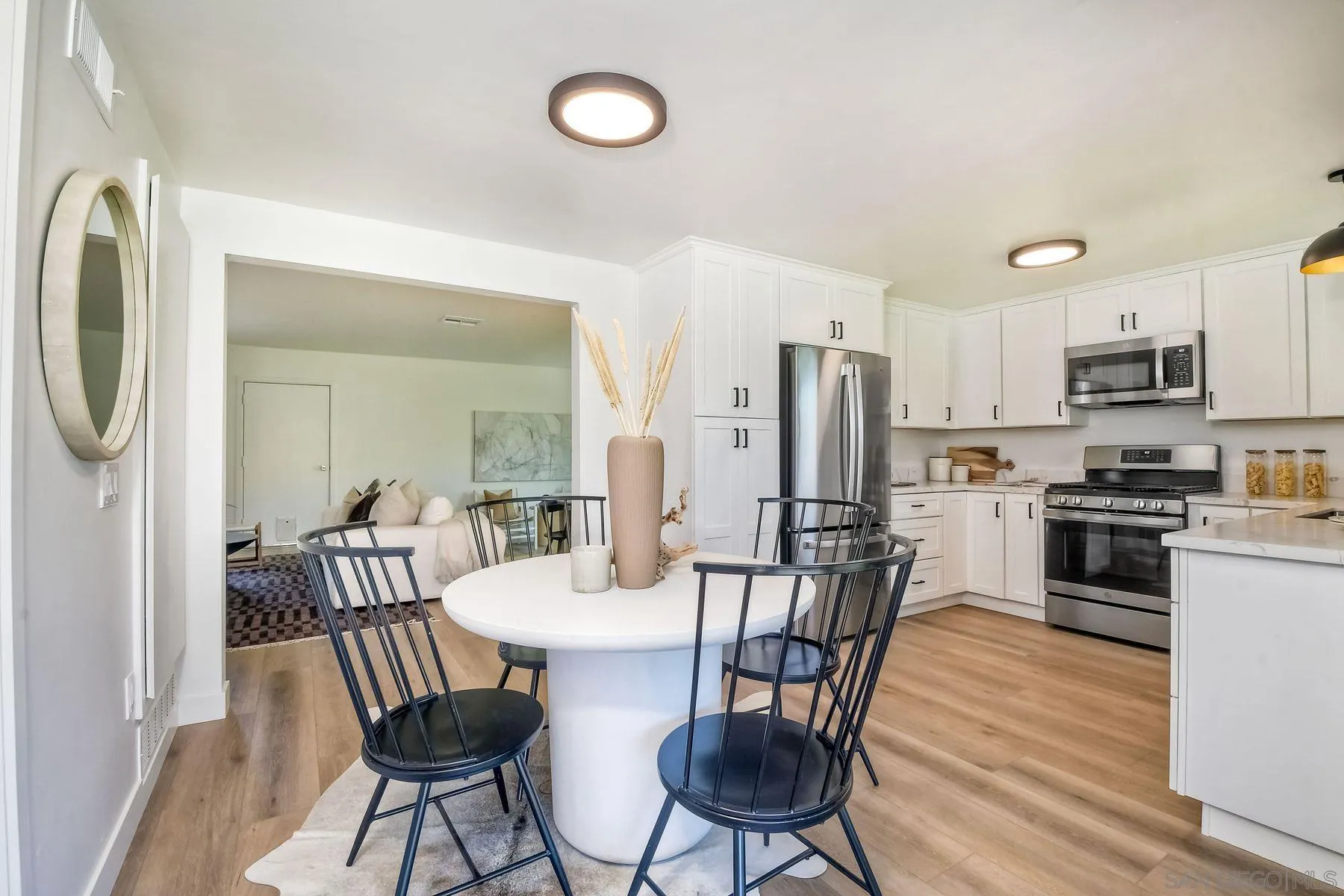 9045 Inverness Road Santee, CA 92071 - Photo 8 of 28 a dining room with furniture and wooden floor