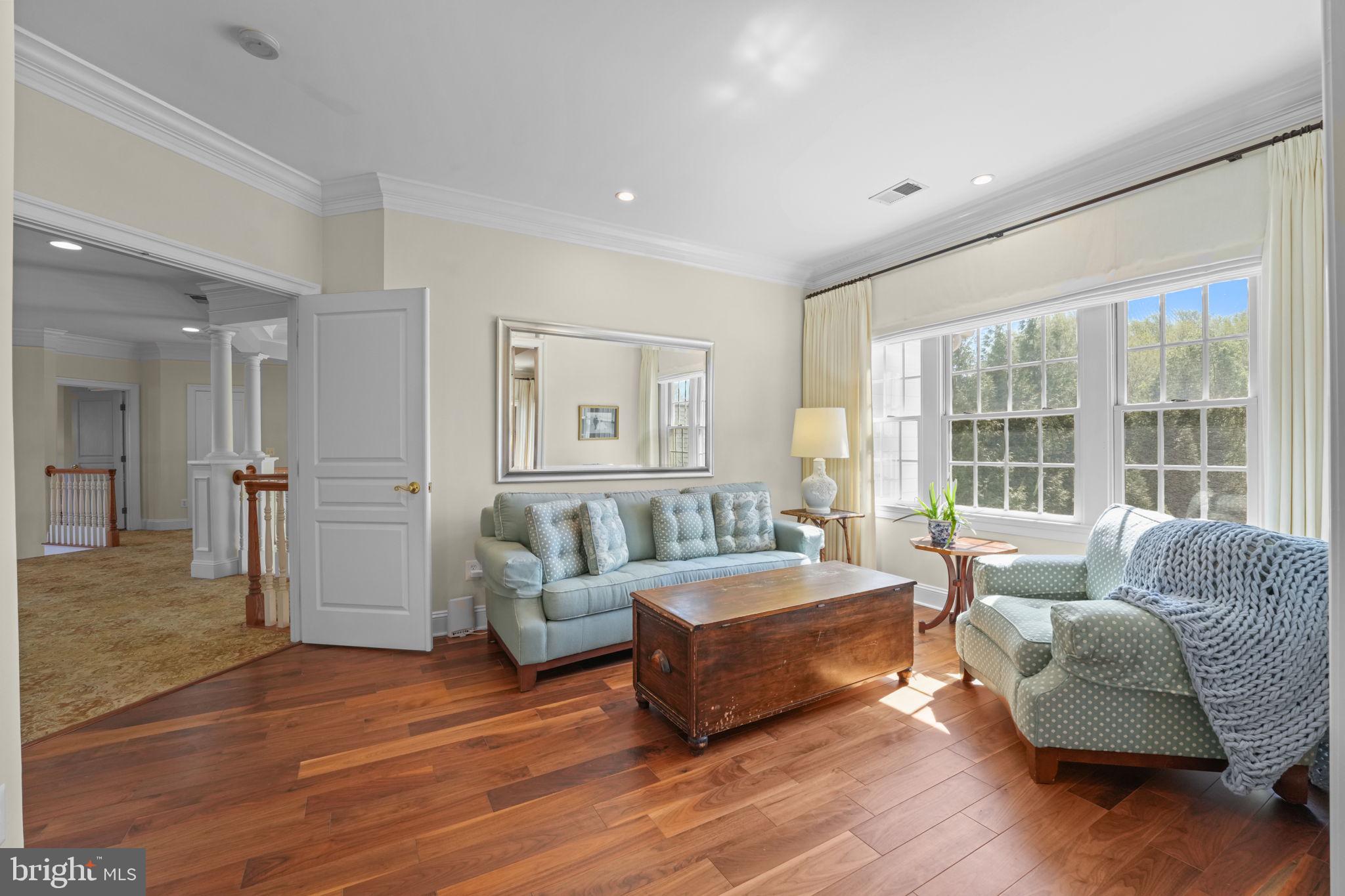 11431 Woolington Road Great Falls, VA 22066 - Photo 24 of 49 a living room with furniture and a large window