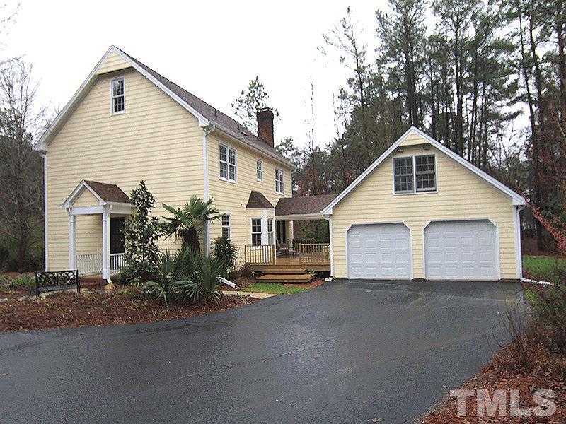 116 Hartland Court Raleigh, NC 27614 - Photo 2 of 25 Reserved location just minutes from Six Forks and 540 you have a private setting for your family. Room for gardening. Many will be happy to find this over sized garage with storage and work shop area! Rare to see in our market.
