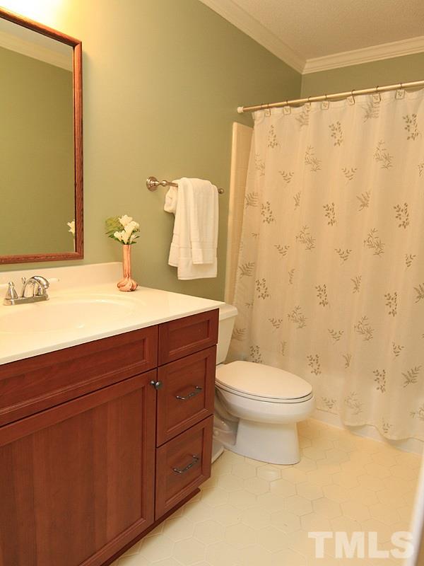116 Hartland Court Raleigh, NC 27614 - Photo 14 of 25 Make a note, the sellers have done many upgrades throughout the house. Bathrooms have been updated with newer cabinets, light fixtures and hardware.