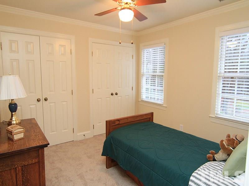 116 Hartland Court Raleigh, NC 27614 - Photo 16 of 25 All bedrooms have a walk in closet or double closet so there is plenty of space in each room for cloths, shoes, and accessories. Blinds installed throughout the house.