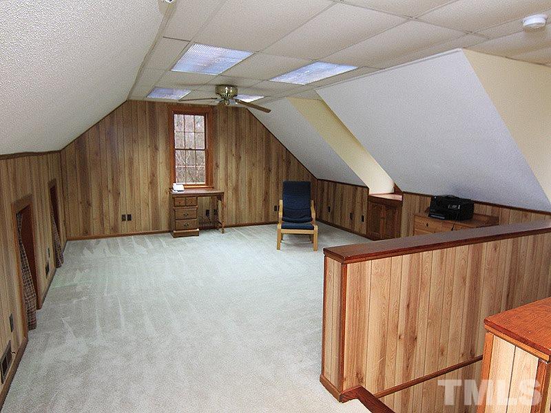 116 Hartland Court Raleigh, NC 27614 - Photo 19 of 25 Sellers had this space finished and permitted (see tax records) when they completed the 3rd floor. There is additional indoor storage under the eve access that is great for storing toys, games, candles, pictures, books and luggage.