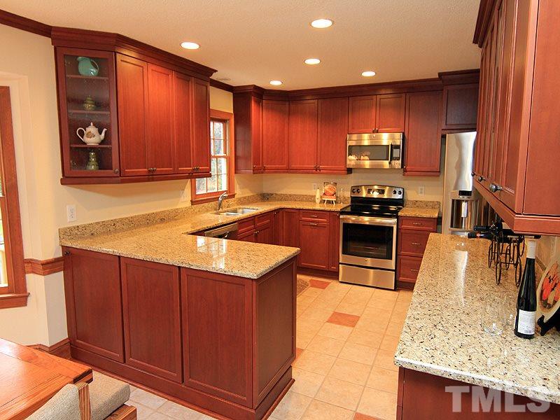 116 Hartland Court Raleigh, NC 27614 - Photo 4 of 25 Completely NEW Kitchen added in 2010. No remodeling necessary the upgrades have been done!! New cabinets with soft close drawers, hardware, stainless steel appliances, can lights, under cabinet lighting, granite countertops and more!!