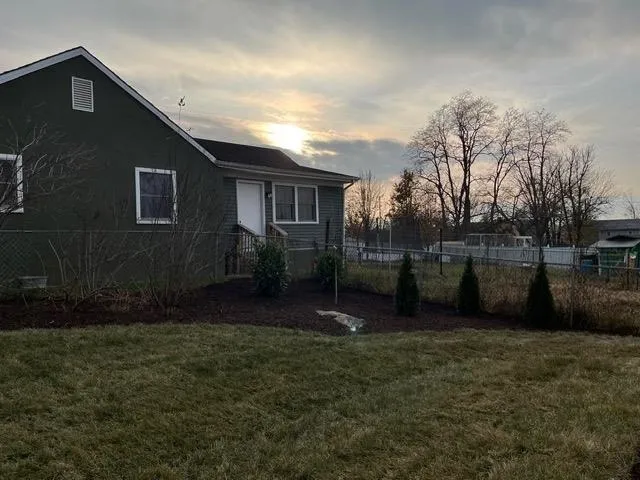 a view of outdoor space and yard
