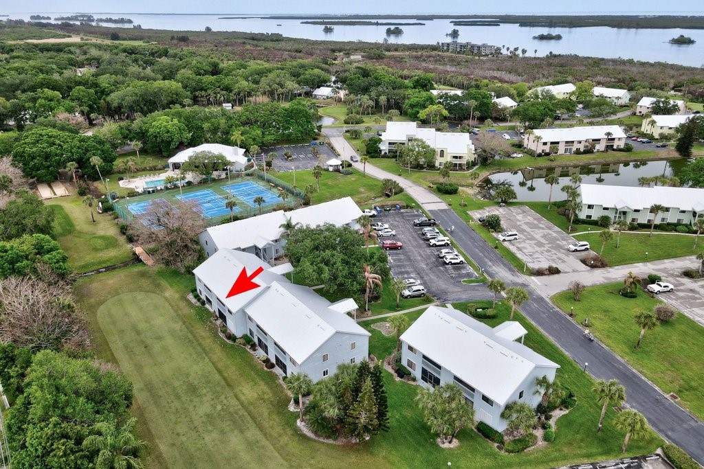 9637 Riverside Drive, Unit 3 Sebastian, FL 32958 - Photo 25 of 36 an aerial view of residential houses with outdoor space
