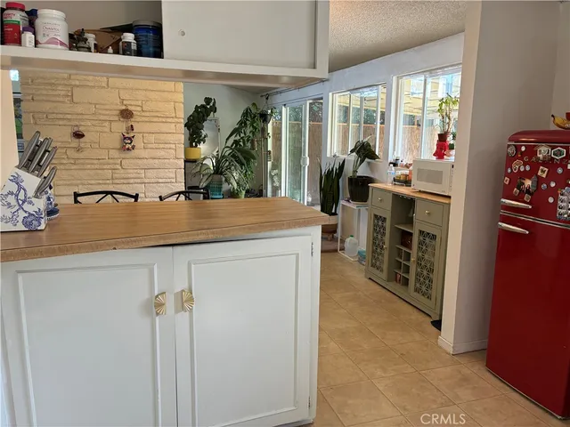 a view of living room with furniture and window