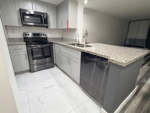 $1,725 | 7650 West McNab Road, Unit 108, Tamarac, FL 33321