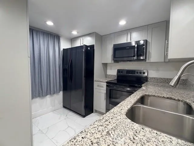 $1,725 | 7650 West McNab Road, Unit 108, Tamarac, FL 33321