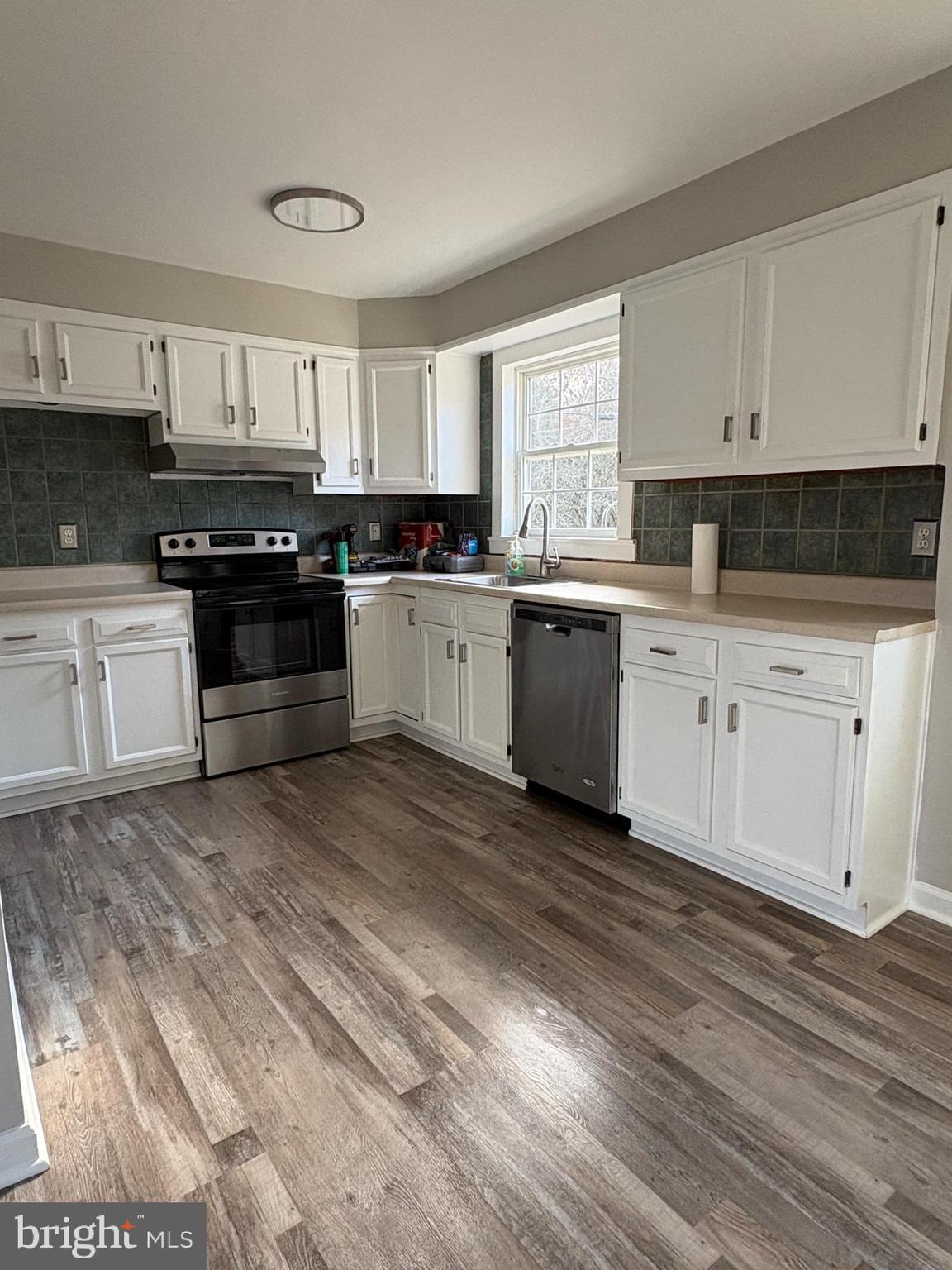 2 Kent Road Elkton, MD 21921 - Photo 6 of 17 a kitchen with granite countertop white cabinets and appliances
