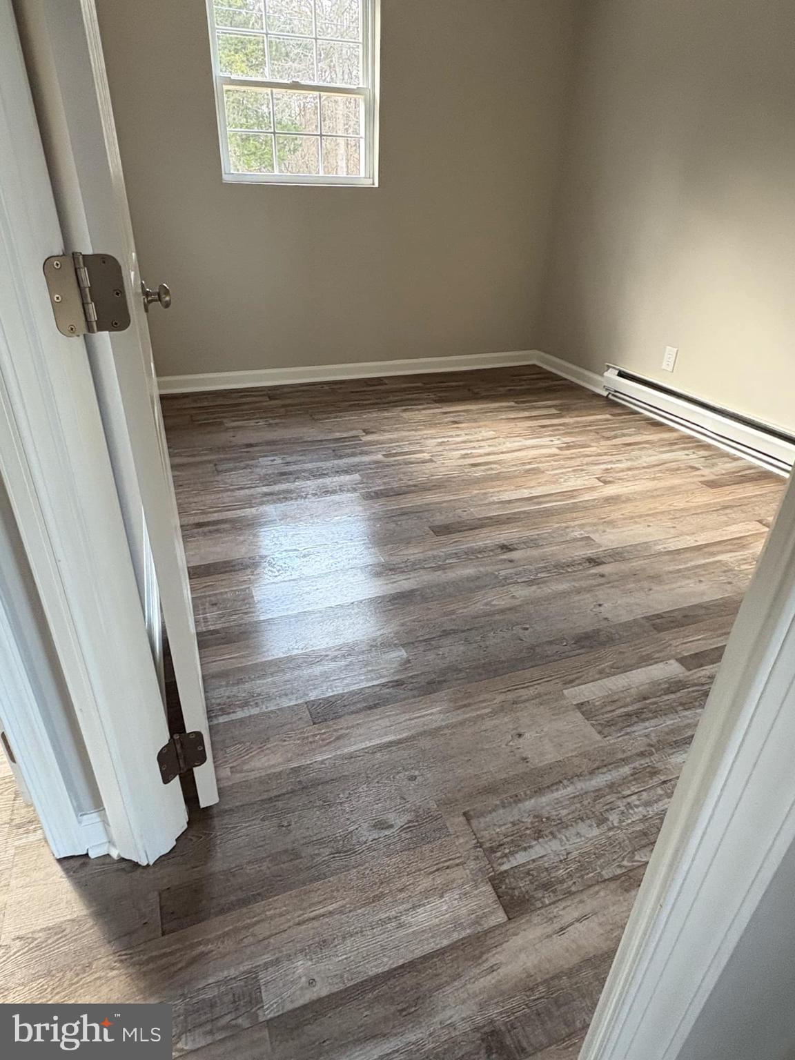 2 Kent Road Elkton, MD 21921 - Photo 9 of 17 a view of empty room with wooden floor