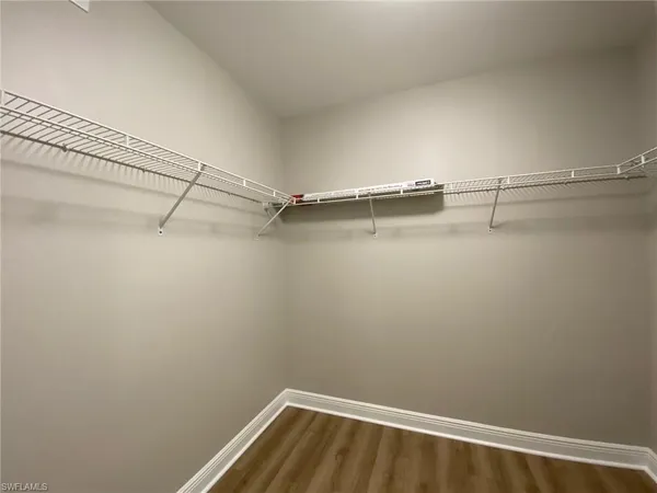 a view of a room with racks on the wall