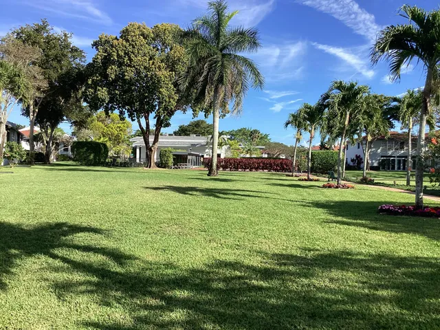 a front view of building with yard