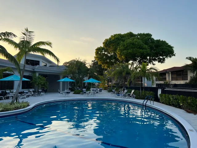 a white refrigerator freezer sitting inside of a kitchen