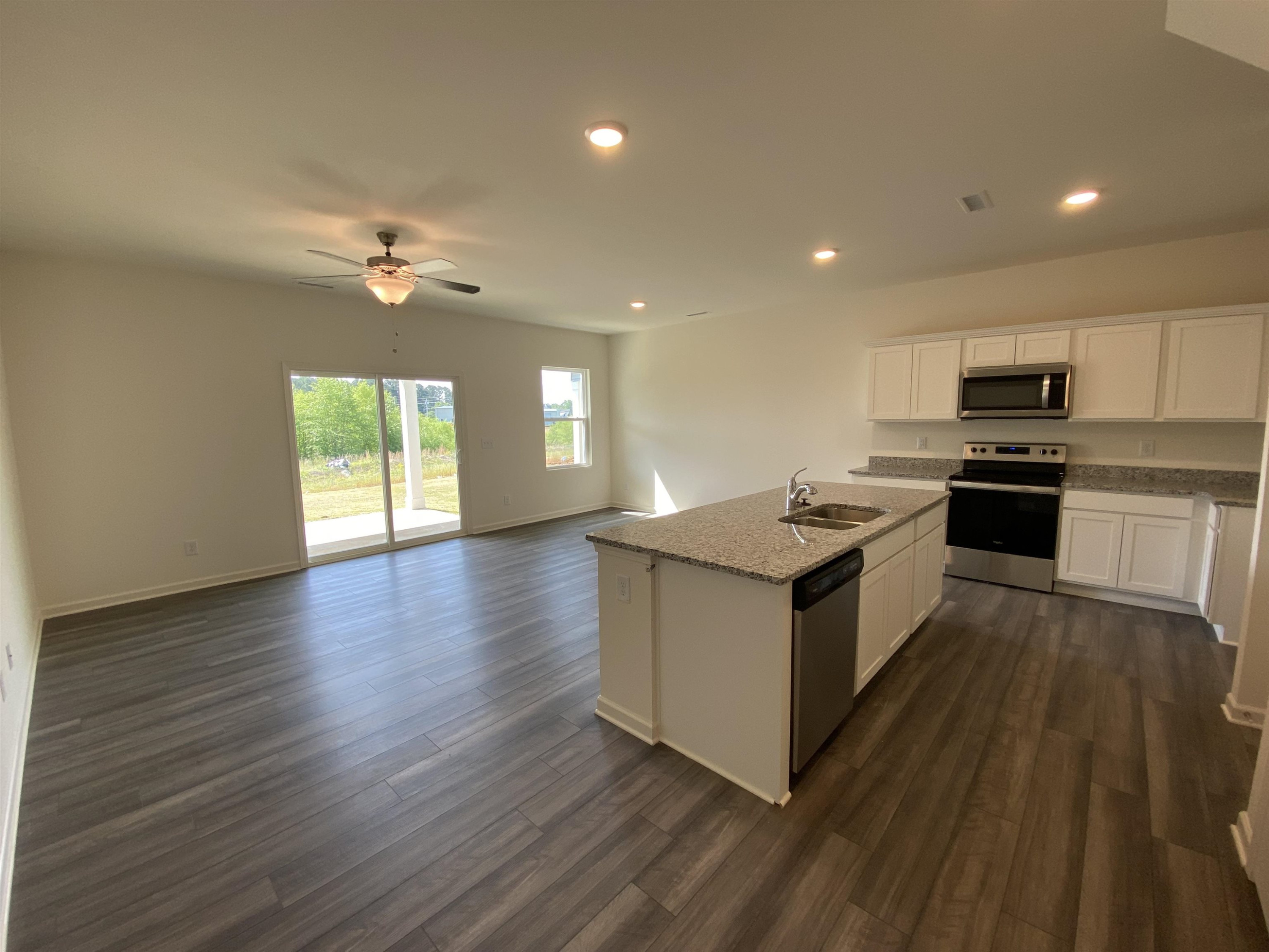 3403 Walker Drive Wilson, NC 27893 - Photo 4 of 19 a kitchen with a stove and a sink