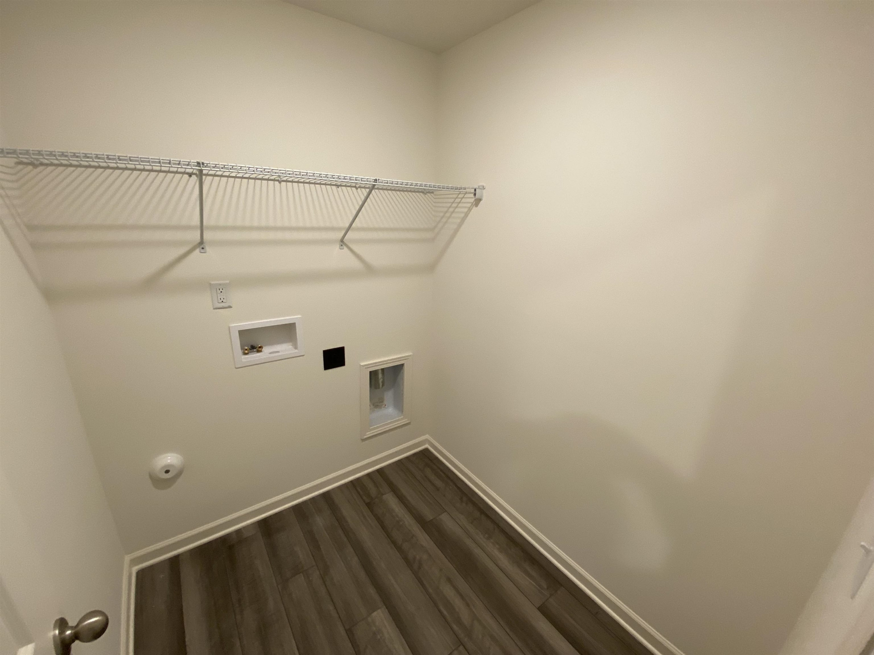 3403 Walker Drive Wilson, NC 27893 - Photo 8 of 19 a view of a room with racks on the wall