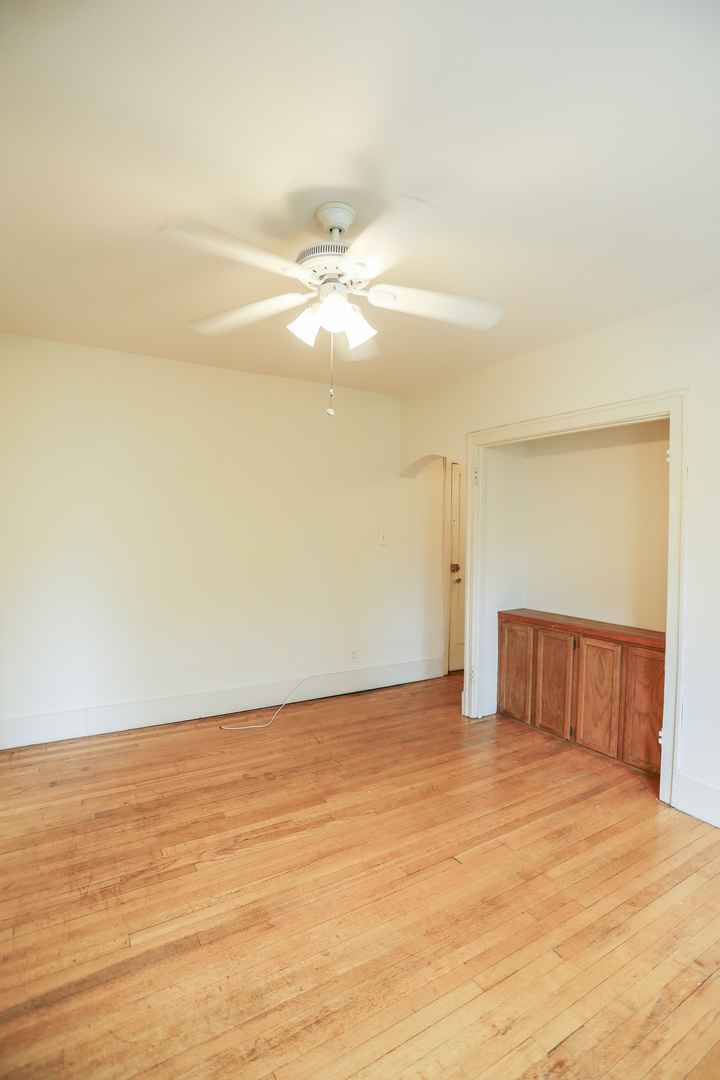 1100 West Roscoe Street, Unit 11 Chicago, IL 60657 - Photo 6 of 9 a view of an empty room