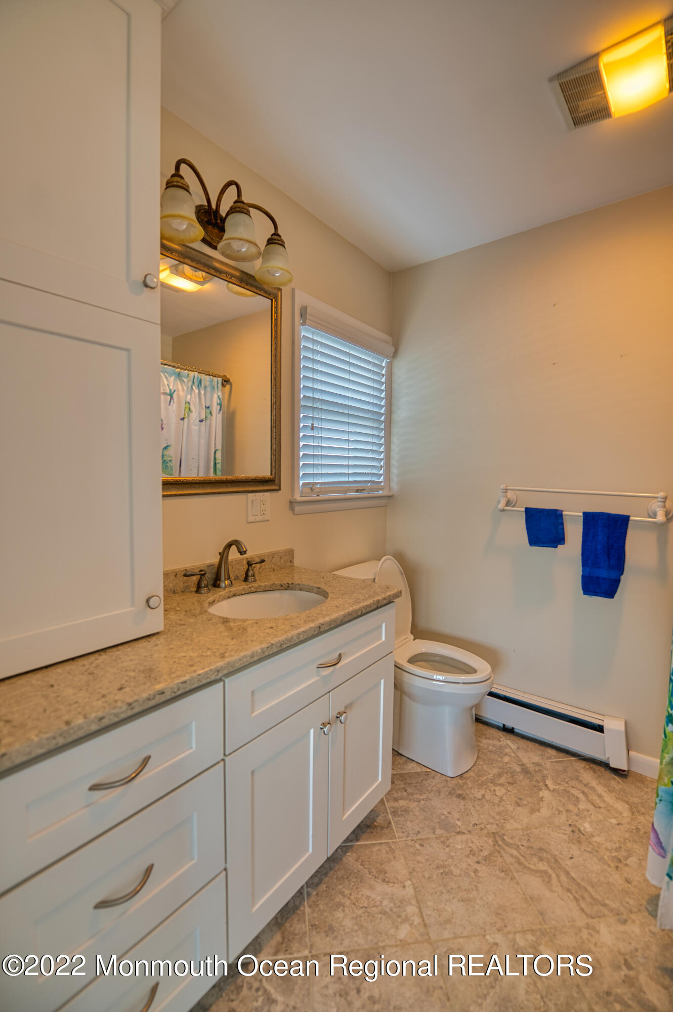 98 Dolphin Road Tuckerton, NJ 08087 - Photo 41 of 43 a bathroom with a toilet sink and mirror