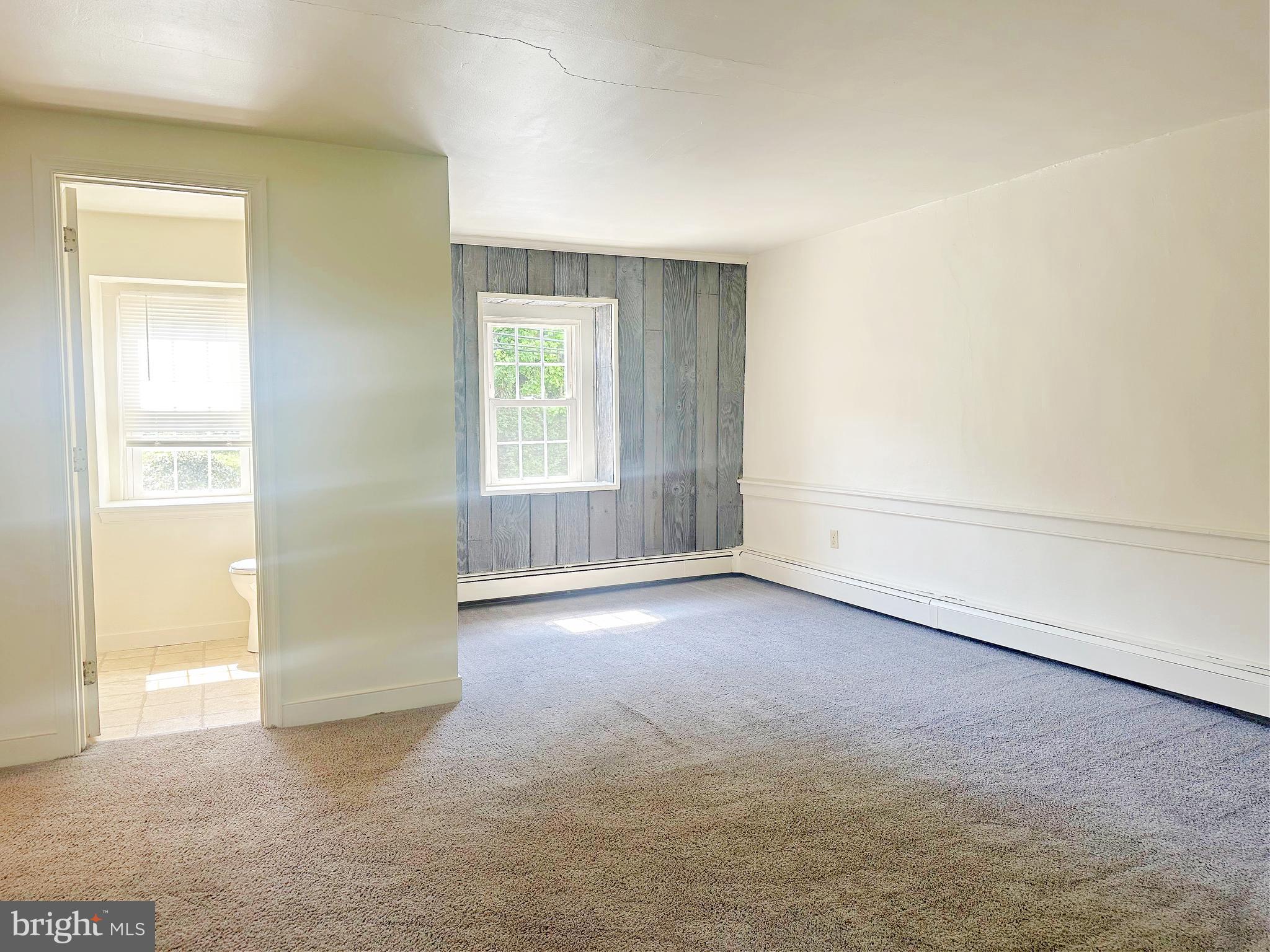 3198 Main Street Green Lane, PA 18054 - Photo 14 of 18 an empty room with windows